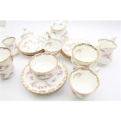 Royal Albert Dimity Rose pattern tea service for six place settings, including teapot, teacups and saucers, sugar bowl and two milk jugs, all with printed mark beneath