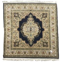 Persian Kirman indigo ground rug, central floral design medallion with matching spandrels, the guarded border decorated with stylised plant motifs 