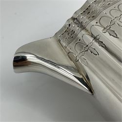 Victorian three-piece silver tea service, comprising teapot, twin handled open sucrier and milk jug, of oval form with shaped rim and C handles, each engraved with crests and bands of strapwork decoration, the milk jug and sucrier with gilt interiors, hallmarked Josiah Williams & Co, Exeter 1881, the teapot with ivory insulators and finial, all contained with a tooled leather, blue silk and velvet lined fitted case, retailed by West & Sun, Dublin 
This item has been registered for sale under Section 10 of the APHA Ivory Act