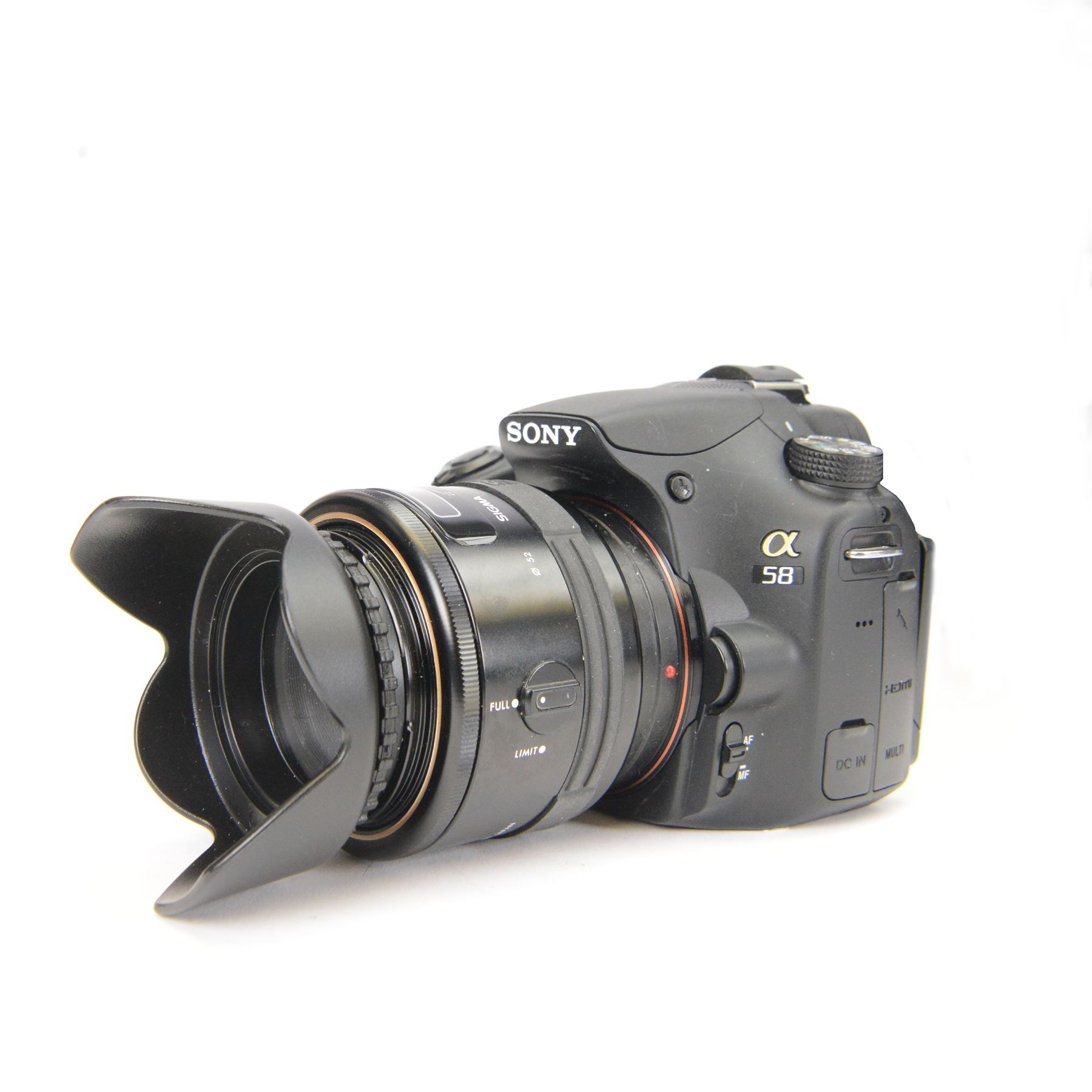 Sony Alpha A58 digital SLT camera serial no. 4656192, with a Sigma AF Macro 1:2.8 f-90mm lens serial no. 2000943, in Huwang soft carry case