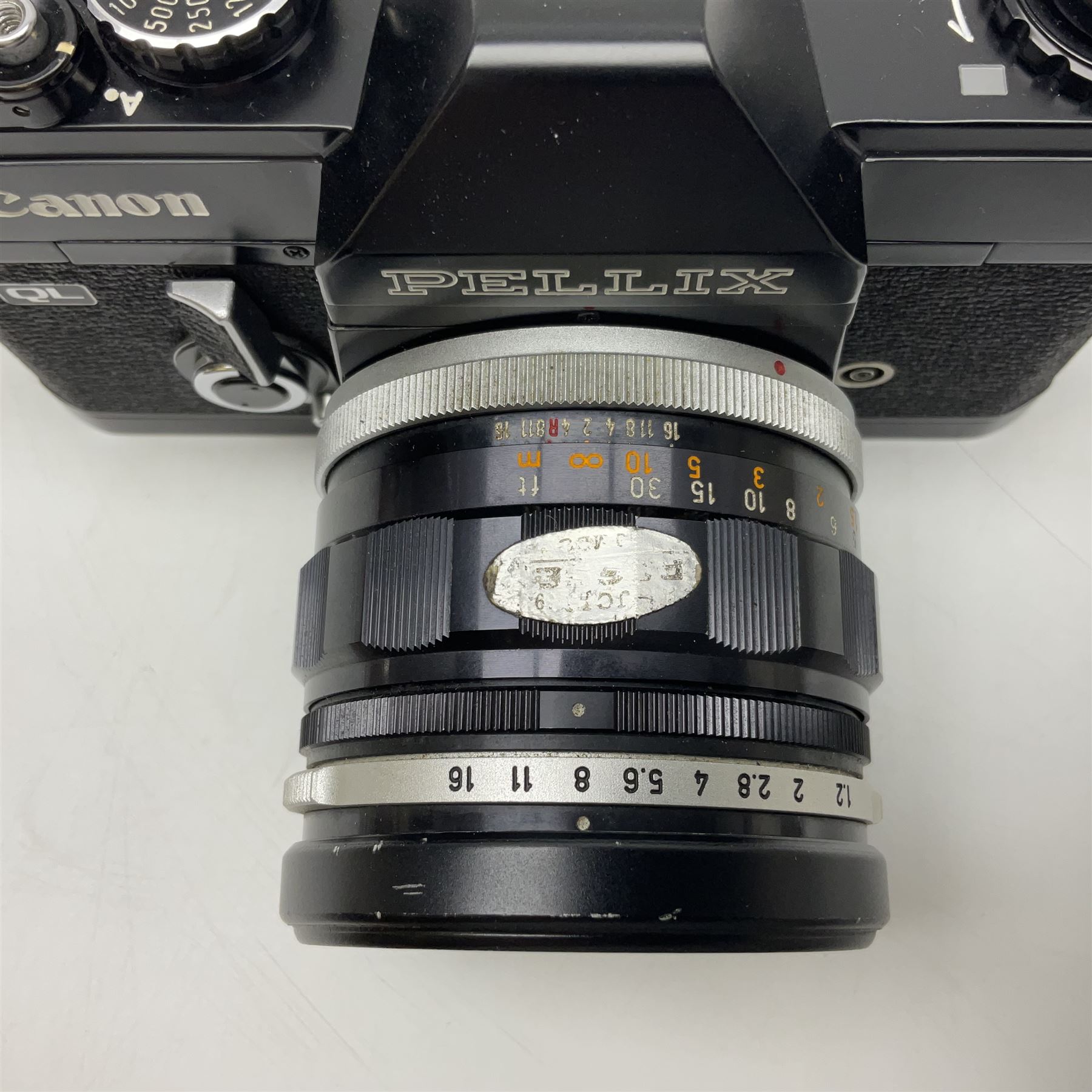 Canon QL Pellix camera body, serial no. 807468, with 'Canon FL 58mm 1:1.2' lens, serial no. 60185