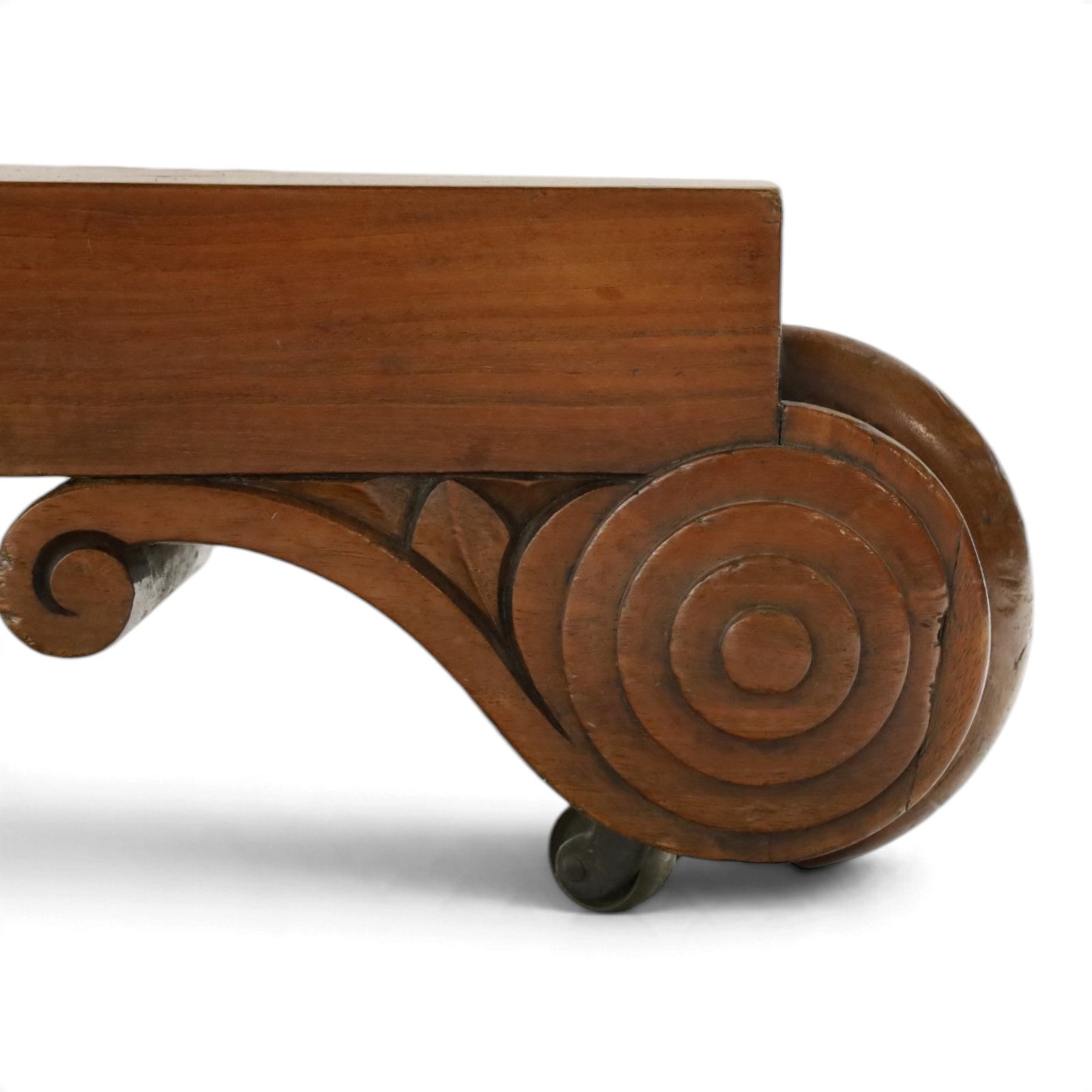 William IV mahogany circular breakfast table, banded frieze over a turned decagon pedestal with lappet carved collar, terminating to a triform platform base with scroll feet and castors