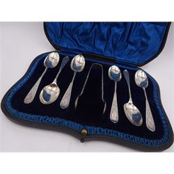 Set of six late Victorian silver teaspoons, each engraved with floral decoration and initials to twist handles, with matching pair of silver sugar tongs, hallmarked James Deakin & Sons, Sheffield 1901, contained within tooled leather silk and velvet lined fitted case 