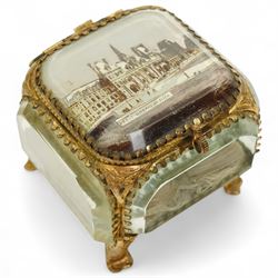 French bevelled glass bijouterie boxes, with gilt metal framing, raised on scrolled and paw feet, the square example with 'Le Hotel de Ville - Paris' scene to cover (2)