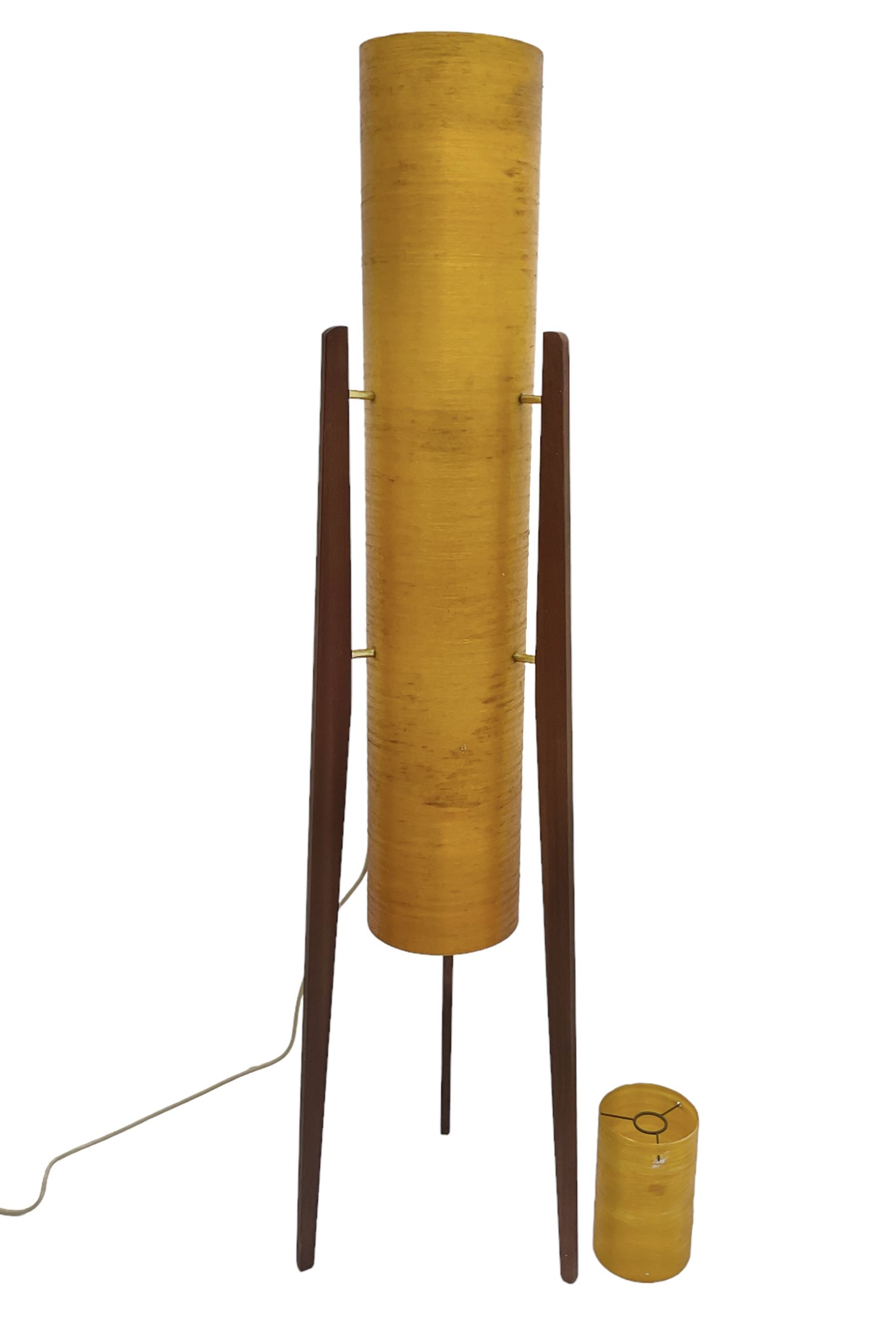 Mid century floor standing rocket lamp, the spun cylindrical orange fibreglass shade supported by three tapering teak legs, together with a matching small cylindrical shade, lamp H112cm