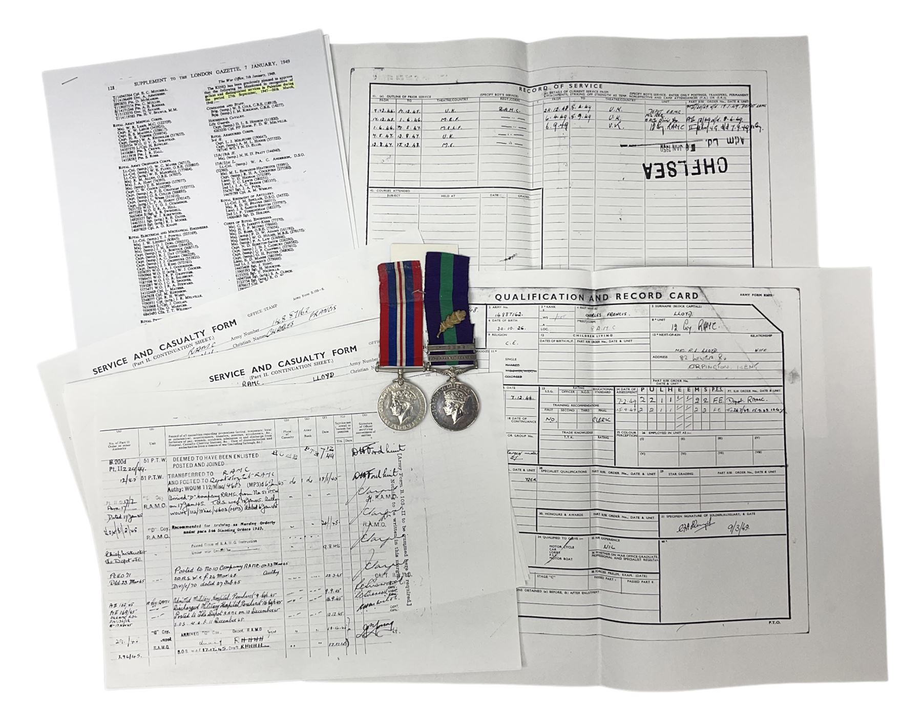 George VI General Service Medal with two clasps for Palestine 1945-48 and Cyprus and MID oak leaf awarded to 14887162 Sjt. C.F.A. Lloyd R.A.M.C. together with WW2 War Medal 1939-1945; both with ribbons; and quantity of photocopied research material including Army Records and London Gazette