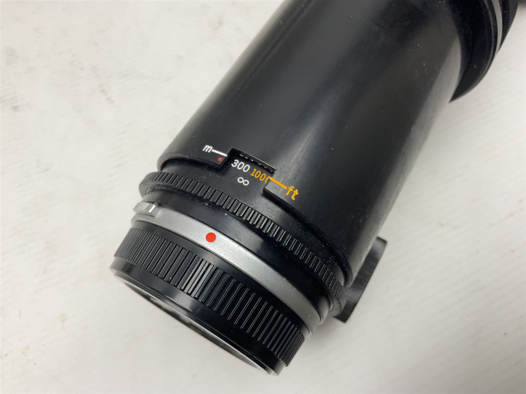 Olympus 'OM-System Zuiko MC Auto-T 1:11 f=1000mm' lens serial number 103010, in carry case