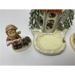 Eight Christmas Hummel figures by Goebel, to include Wintertime Chapel candle holder, Winter Fun, Christmas Morning, Christmas Time and Gingerbread Lane, tallest H21cm