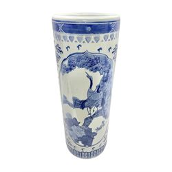 Blue and white umbrella stand, decorated with panels of birds amongst flowers and foliage, with four character mark beneath, H61.5cm