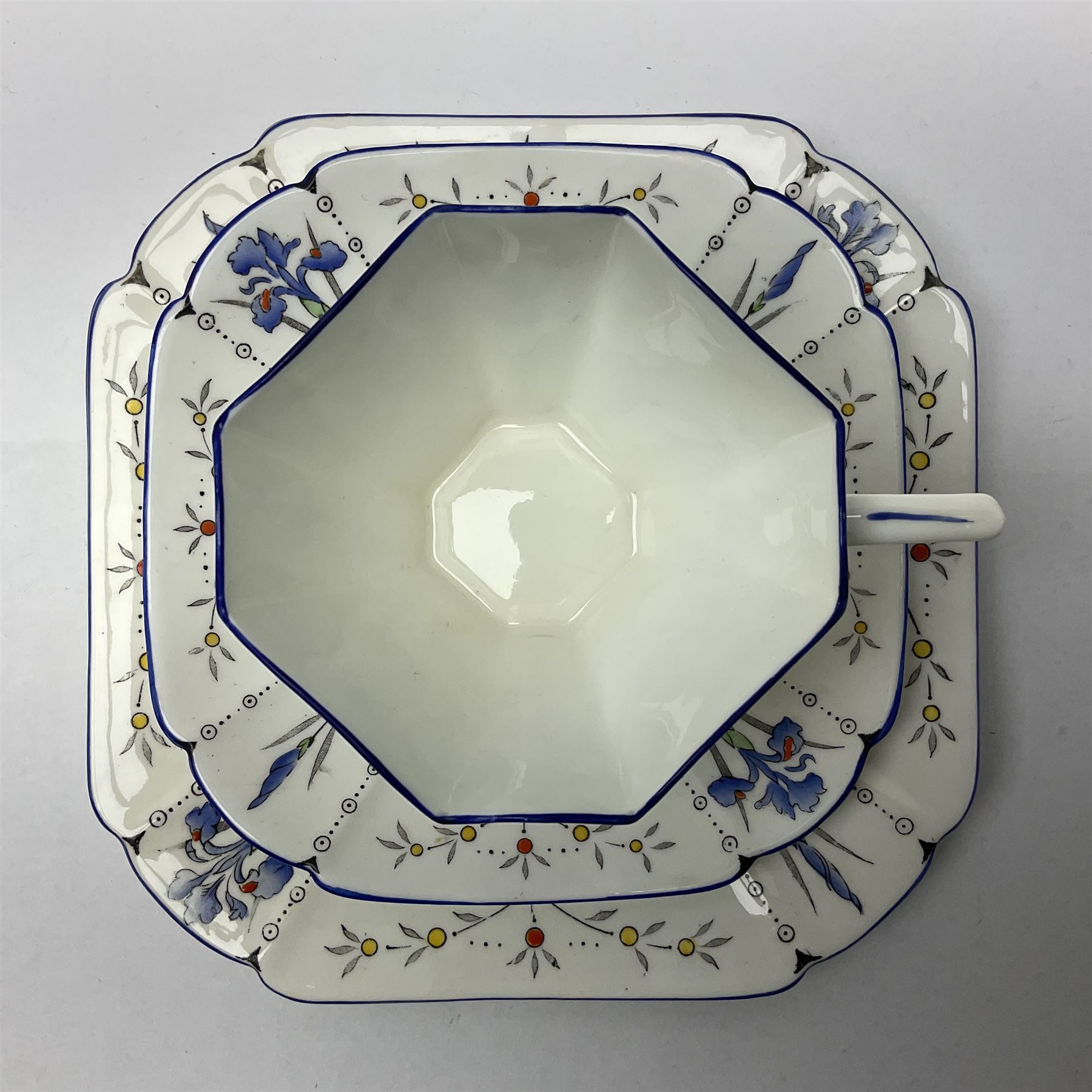 1920s Shelley Queen Anne shaped trio, decorated in the Blue Iris pattern no. 11561, ith printed mark beneath 