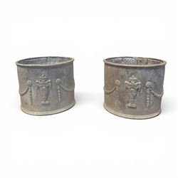 Pair of 19th century Neoclassical design lead garden planters of cylindrical form, the bod...