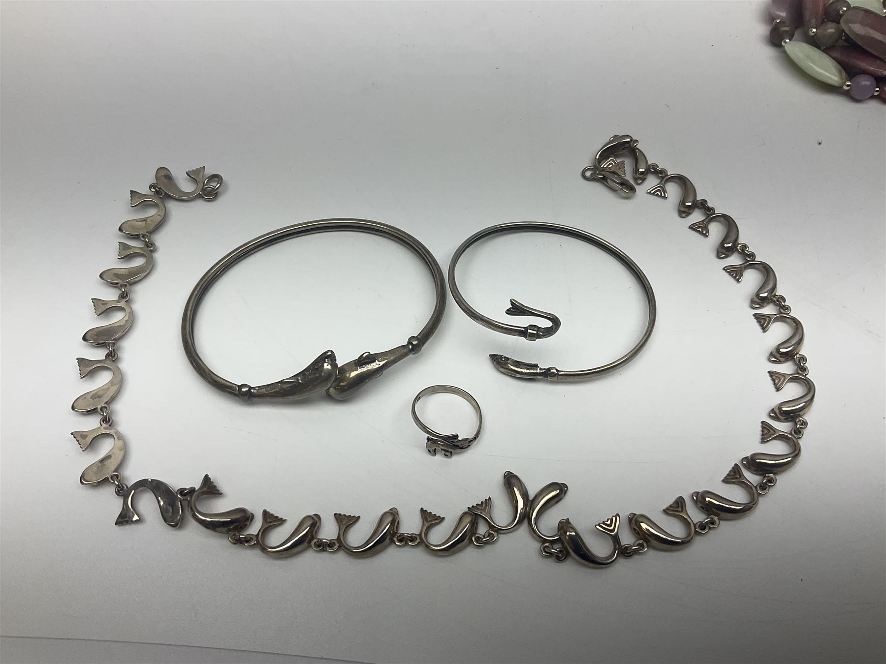 Pair of 9ct gold screw back earrings, silver dolphin jewellery, including necklace, bracelet, ring and earrings, other silver jewellery, two Sekonda wristwatches and a collection of costume jewellery 