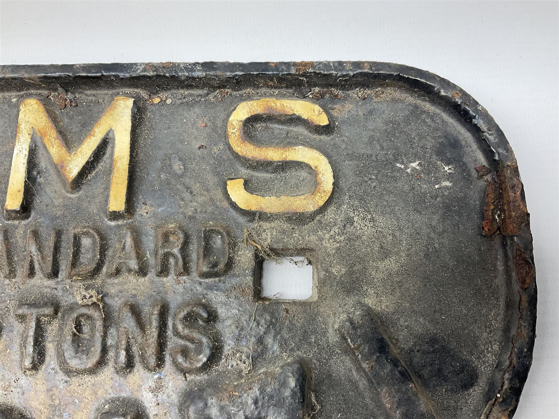Three cast iron railway wagon plates of D shaped form to include Southern Railway, LMS and GWR, L27.5cm