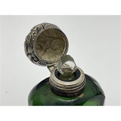 Silver mounted green glass scent bottle, with original stopper, and embossed silver cover, H7cm