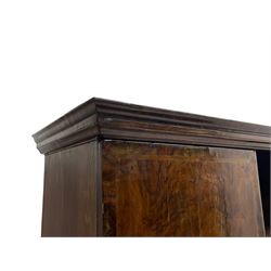 George II walnut cabinet on stand, the moulded projecting corner over two doors with quarter-matched veneered doors, the interior fitted with shelves, the stand with moulded upper rails over two drawers, on a series of spiral turned supports with shaped waved stretchers, on turned feet