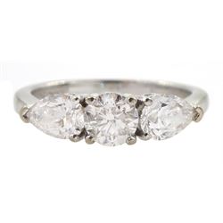 18ct white gold three stone diamond ring, central round brilliant cut diamond with two pear shaped diamonds either side, hallmarked, total diamond weight 1.48 carat