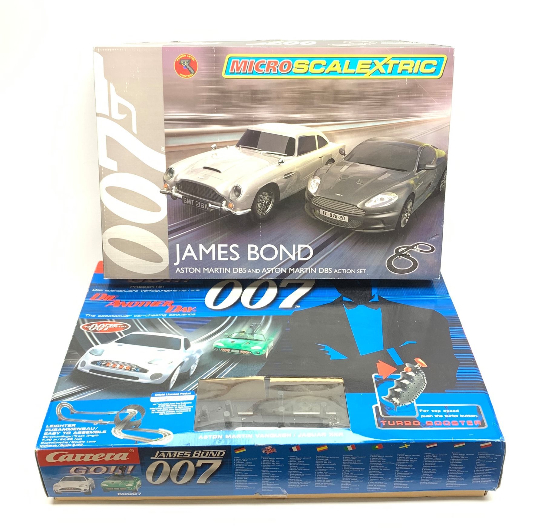 Carrera Go James Bond Die Another Day slot-car racing set No.60007; and MicroScalextric James Bond Aston Martin DB5 and DBS racing set, both boxed (2)
