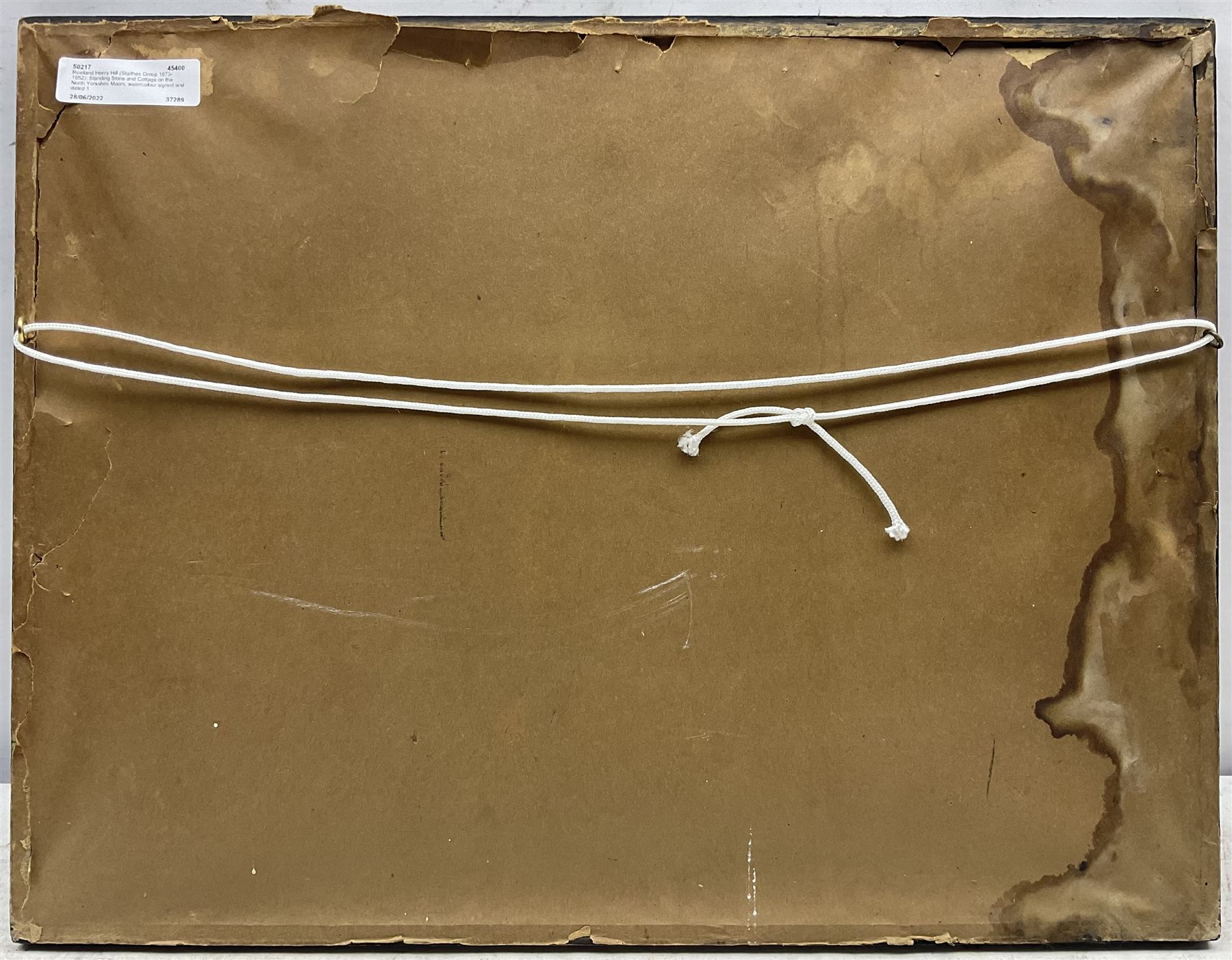 Rowland Henry Hill (Staithes Group 1873-1952): Standing Stone and Cottage on the North Yorkshire Moors, watercolour signed and dated 1931, 26cm x 36cm