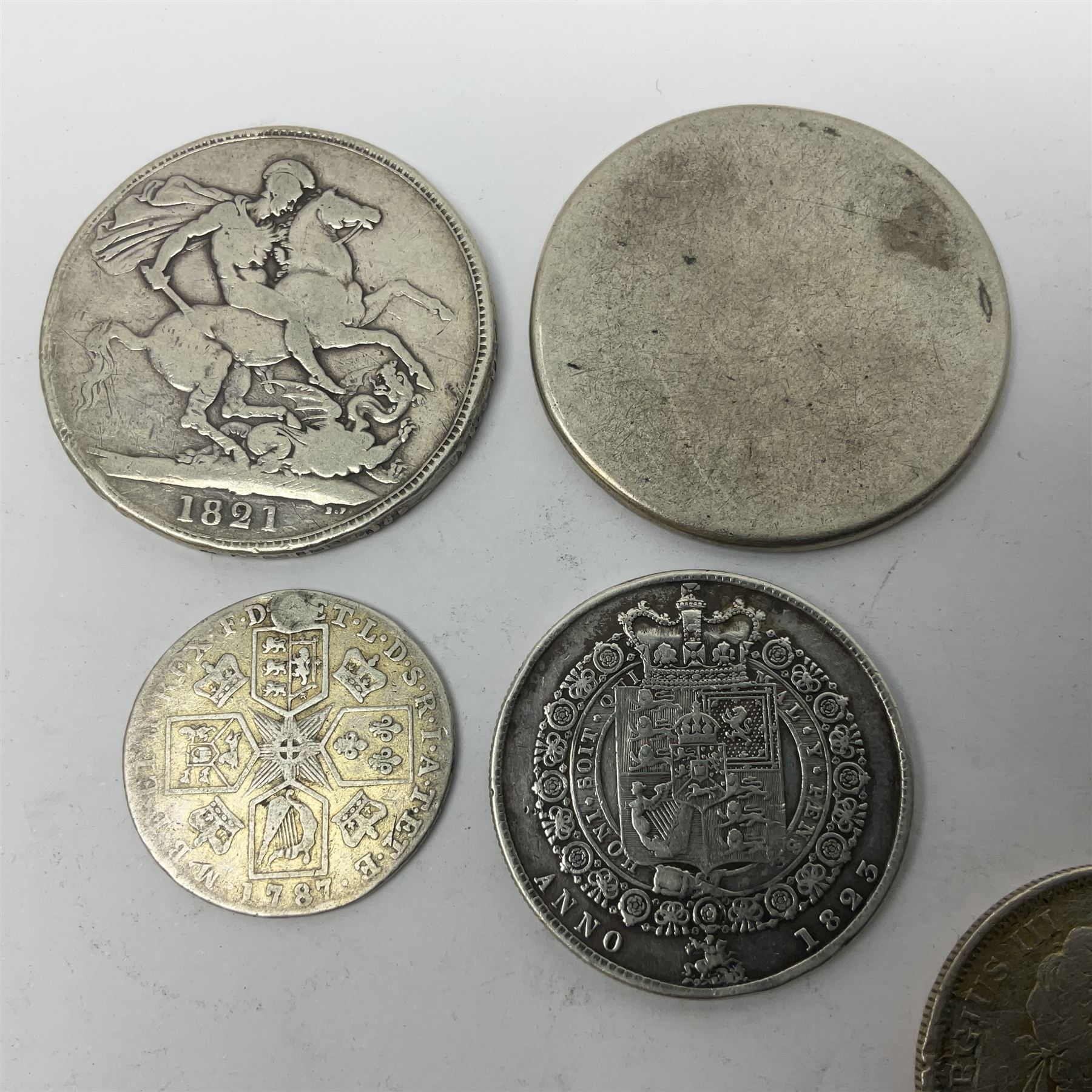 Approximately 200 grams of Great British pre 1920 silver coins, mostly previously mounted or holed, including crowns, half crowns etc