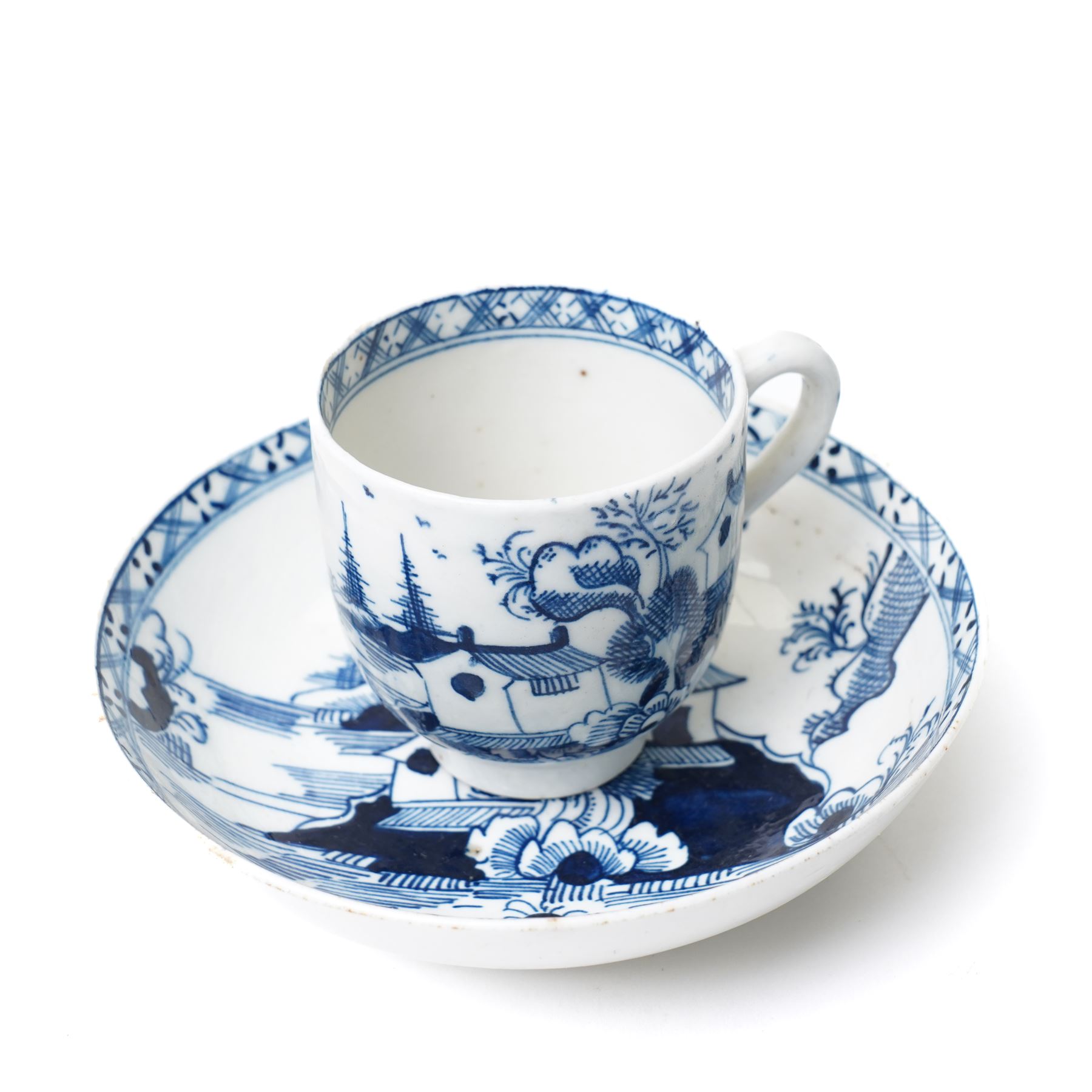 18th century Lowestoft porcelain coffee cup and saucer painted in the 'Two Pagoda Island' pattern, c1765-75, coffee cup H5.5cm