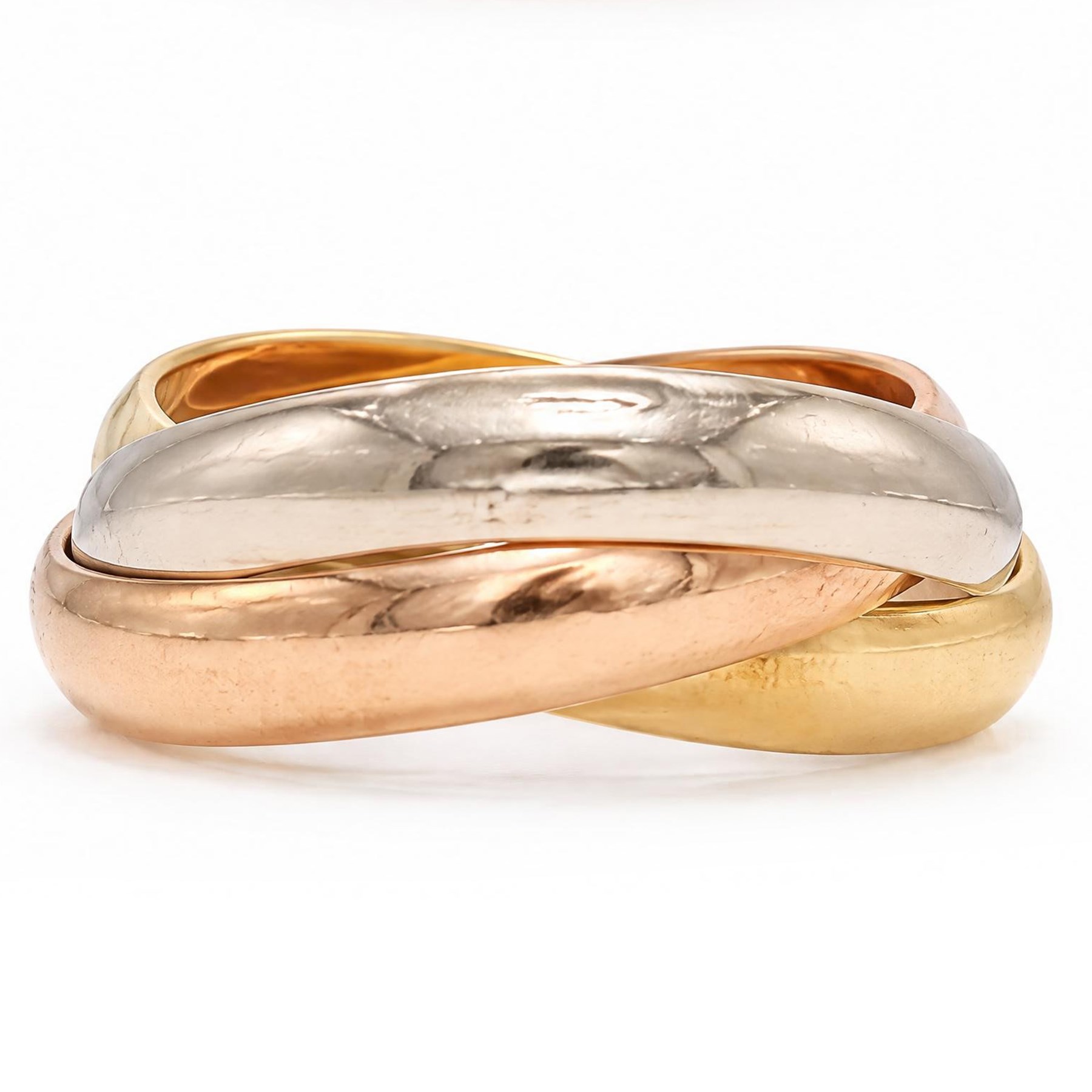 Les must de Cartier 18ct gold Trinity ring, with three interlinked rose, white and yellow gold bands, with certificate dated 1983