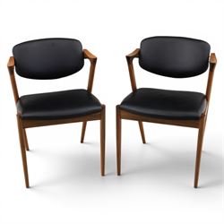 Kai Kristiansen (Danish c.1929-2022) - Pair of mid-20th century teak elbow chairs upholste...