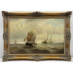 Edward King Redmore (British 1860-1941): Sailing Vessels off the Coast, oil on canvas signed 49cm x 74cm