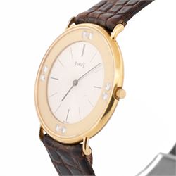Piaget Altiplano ultra thin 18ct gold diamond set manual wind wristwatch, Ref. 2642, Cal. 20P2, silvered dial with baton hour markers, the gold outer ring set with eight round brilliant cut diamonds, on brown leather strap with Piaget 18ct gold buckle and 18ct gold diamond set spacer