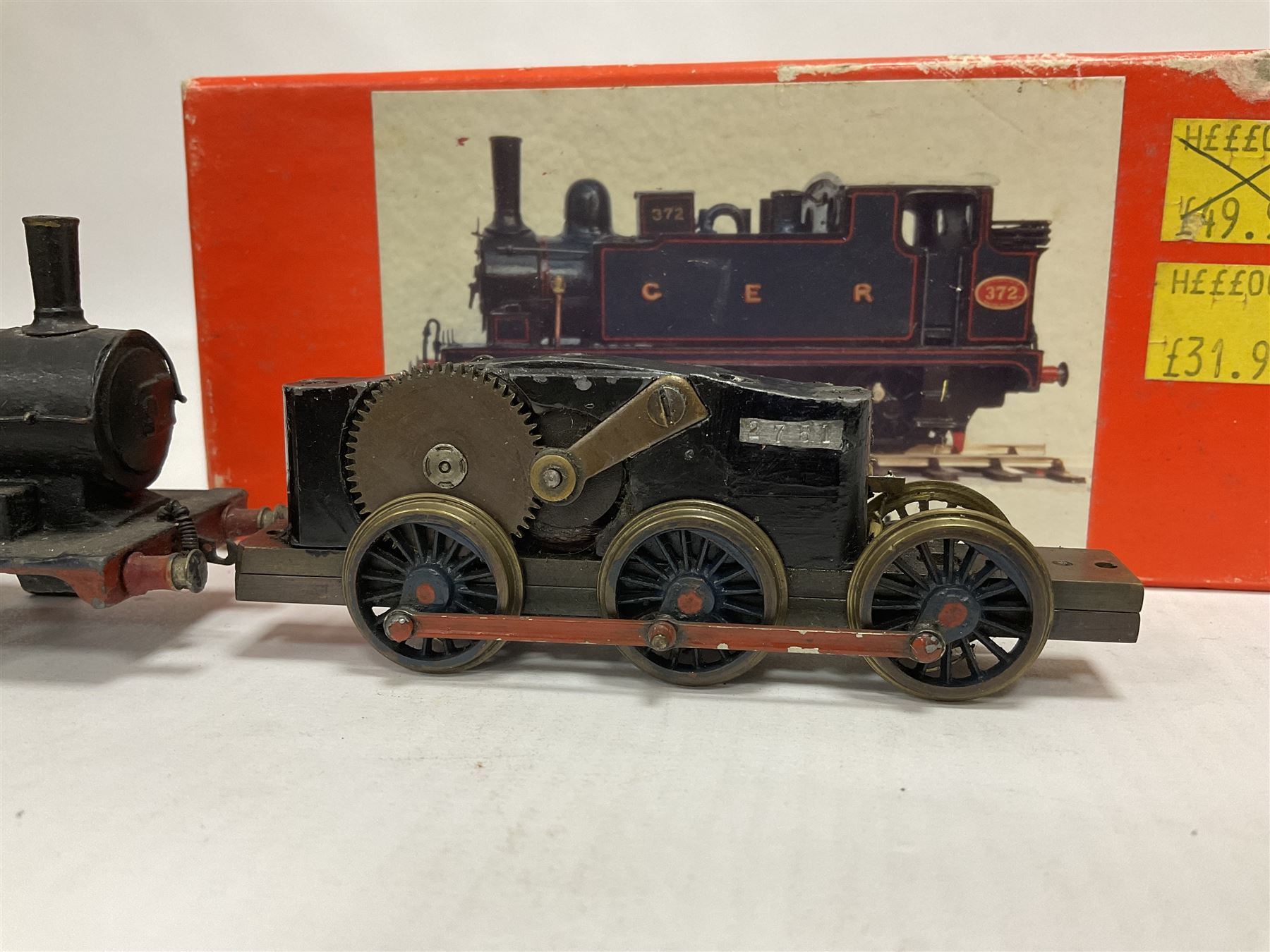 ‘00’ gauge - three steam locomotives and comprising two kit built examples; J69 Class 0-6-0T no.68619 in BR dark blue; J69 Class 0-6-0T no.68626 in BR black; with Wills Finecast boxes; one further similar example Class J67 ‘Buckjumper’ 0-6-0 no.372 being comprised of a singular heavy metal body and chassis; all models with Wills Finecast boxes (3) 