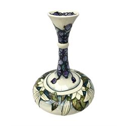 Moorcroft vase, of compressed form with a tall flared neck, decorated in the Juneberry pattern, circa 2000, H25cm