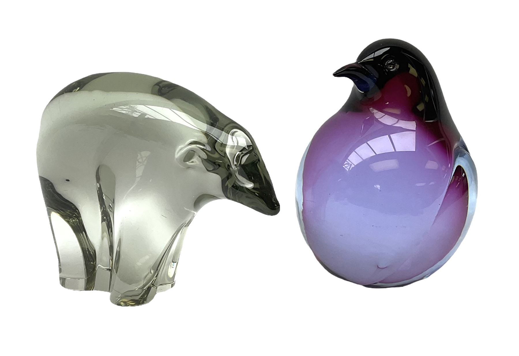 Livio Seguso (Italian, 1930-), Murano glass penguin paperweight in purple and blue, H12.5cm, together with another paperweight modelled as a polar bear for Graglas of Germany, c1970, both with etched marks beneath
