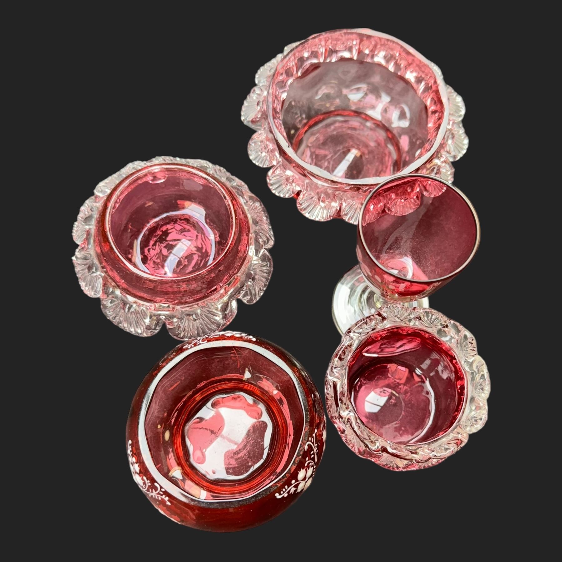 Jack in the Pulpit vase, with a Vaseline rim, together with a collection of cranberry glass, including enameled jars 