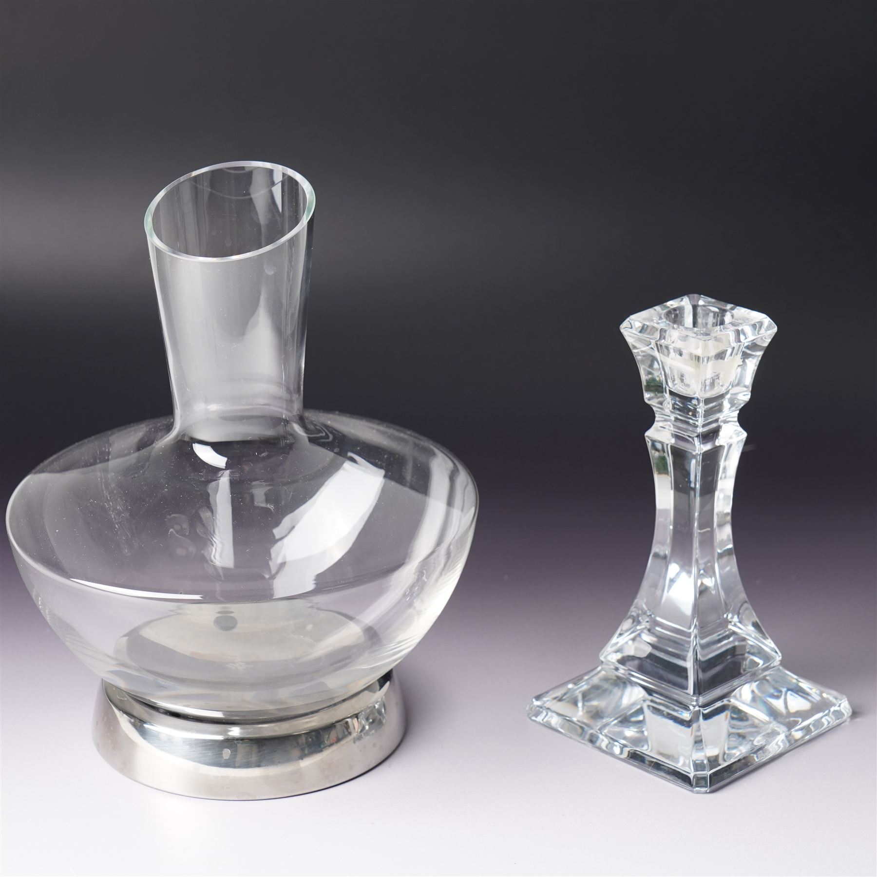 WMF glass decanter, designed by Jette Joop, on steel stand, boxed, H23cm; Tiffany & Co glass candlestick, marked to base, H18cm (2)