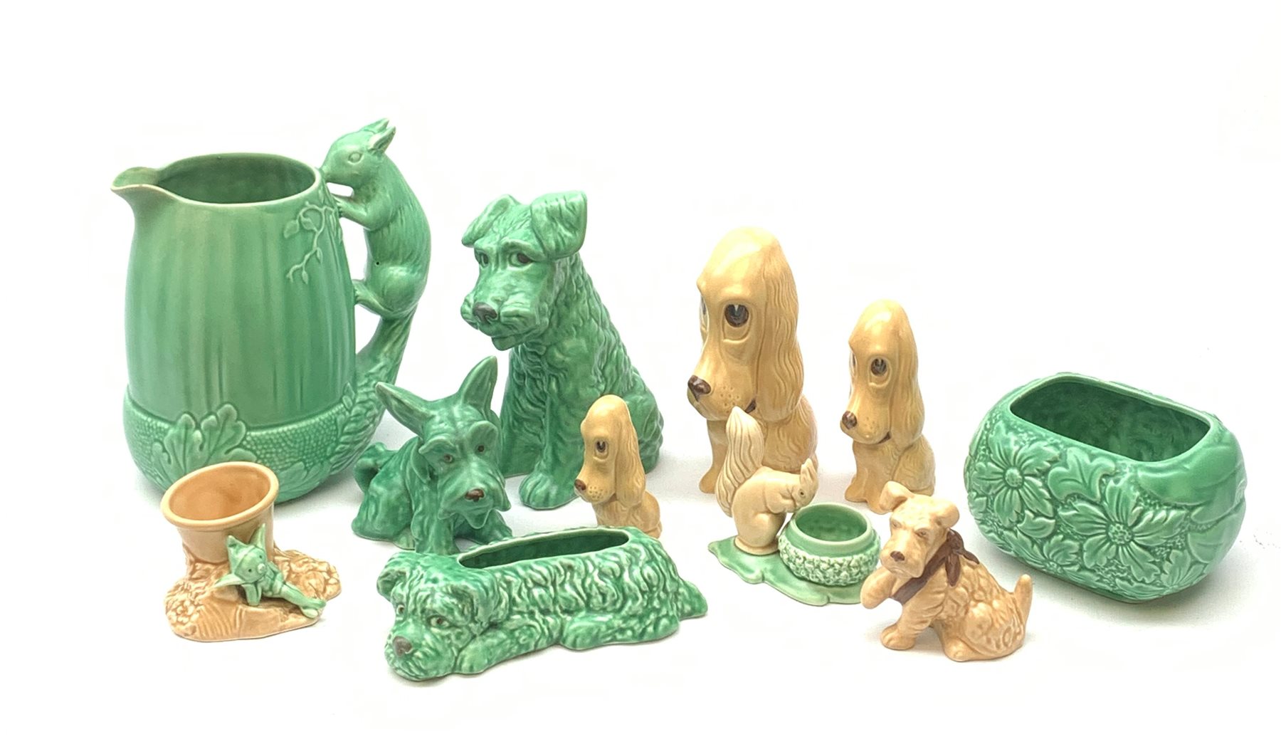 A collection of Sylvac pottery, comprising a graduated set of dogs, no  2951, 2950, 2938, four
