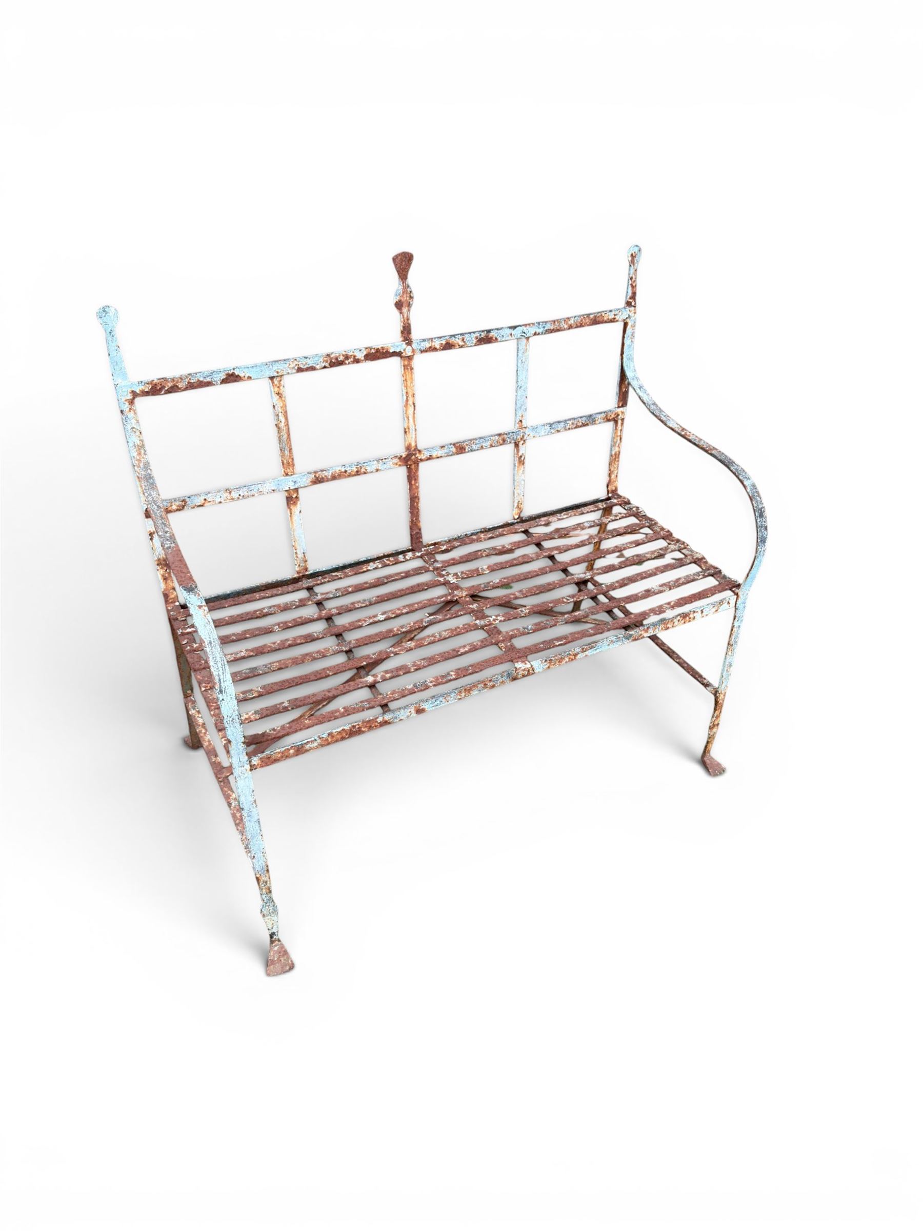 Regency period wrought iron strapwork garden bench, cresting rail with central Scottish thistle motif and flanking pediments, in distressed blue painted finish
