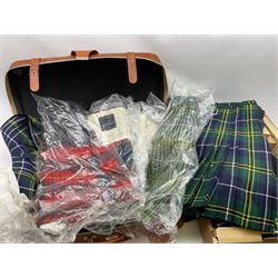 Quantity of highland dress to include approximately is kilts with examples by Locharron , sporrans, belts, various accessories, a tam o' shanter, Scottish pewter jewellery, a pair of antlers mounted upon a wooden shield plaque with tartan upholstery etc and a leather travel case