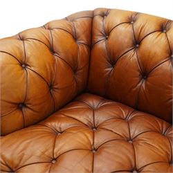 Tetrad - 'Oskar' grande three-seat sofa, Chesterfield shape with rolled arms over serpentine back and front, upholstered in fully buttoned tan leather, raised on reed-moulded feet of globular form