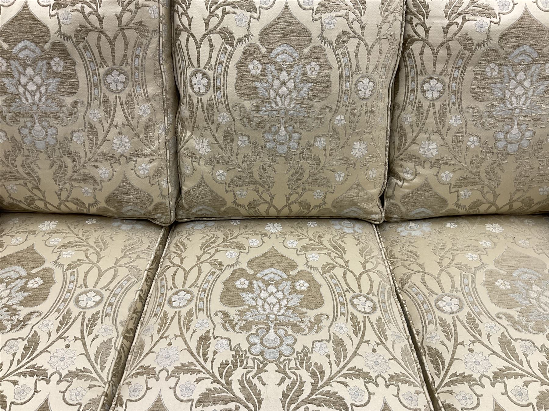 Steed Kedleston three seat sofa, and matching wing back armchair, upholstered in pale gold fabric