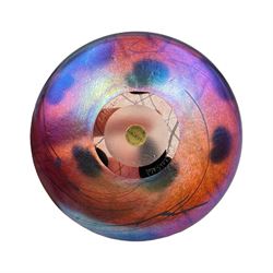 John Ditchfield for Glasform disc paperweight in iridescent cranberry with green lily pads and silver hallmarked frog to top, D14cm