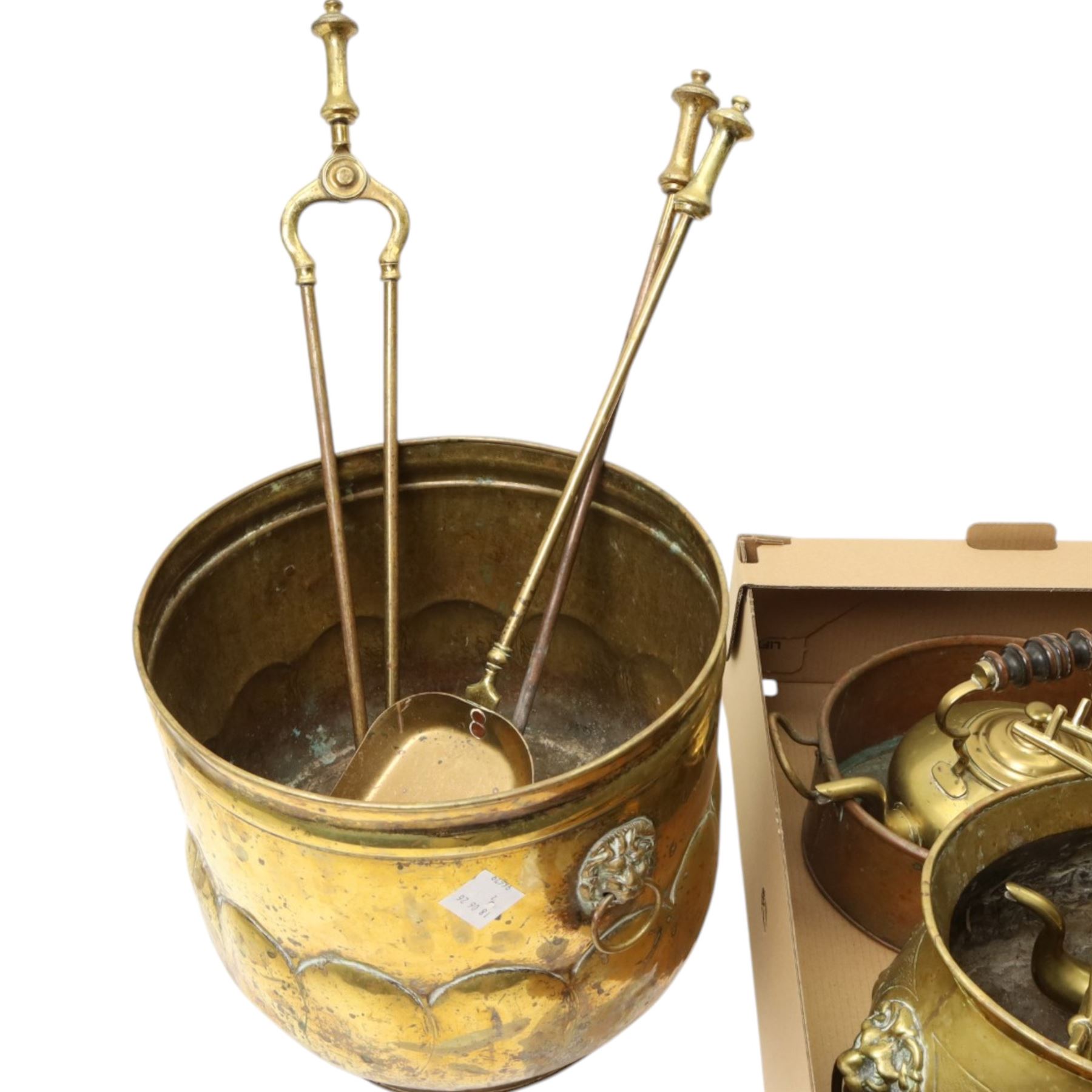 Collection of brassware, including fireside accessories, coal bucket, kettle and stand, two candlesticks, etc