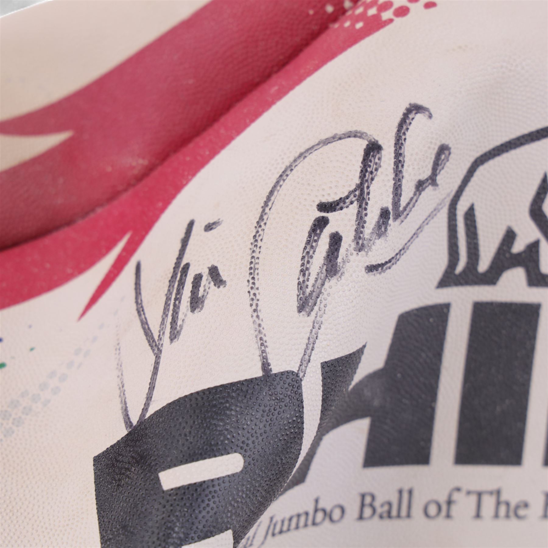 Three signed rugby balls, including 2017 Lions Tour Rhino Jumbo ball, signed by eight players, including Greig Laidlaw, Rugby world cup 2003 example and a 2001 British Lions example