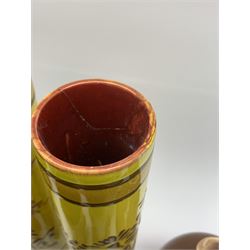 Pair of early 20th century yellow glaze cylindrical vases with floral decoration, H29cm, various Bretby circular planters, small Bretby bottle vase with drip glaze, pair of three-handled vases and other similar pottery 