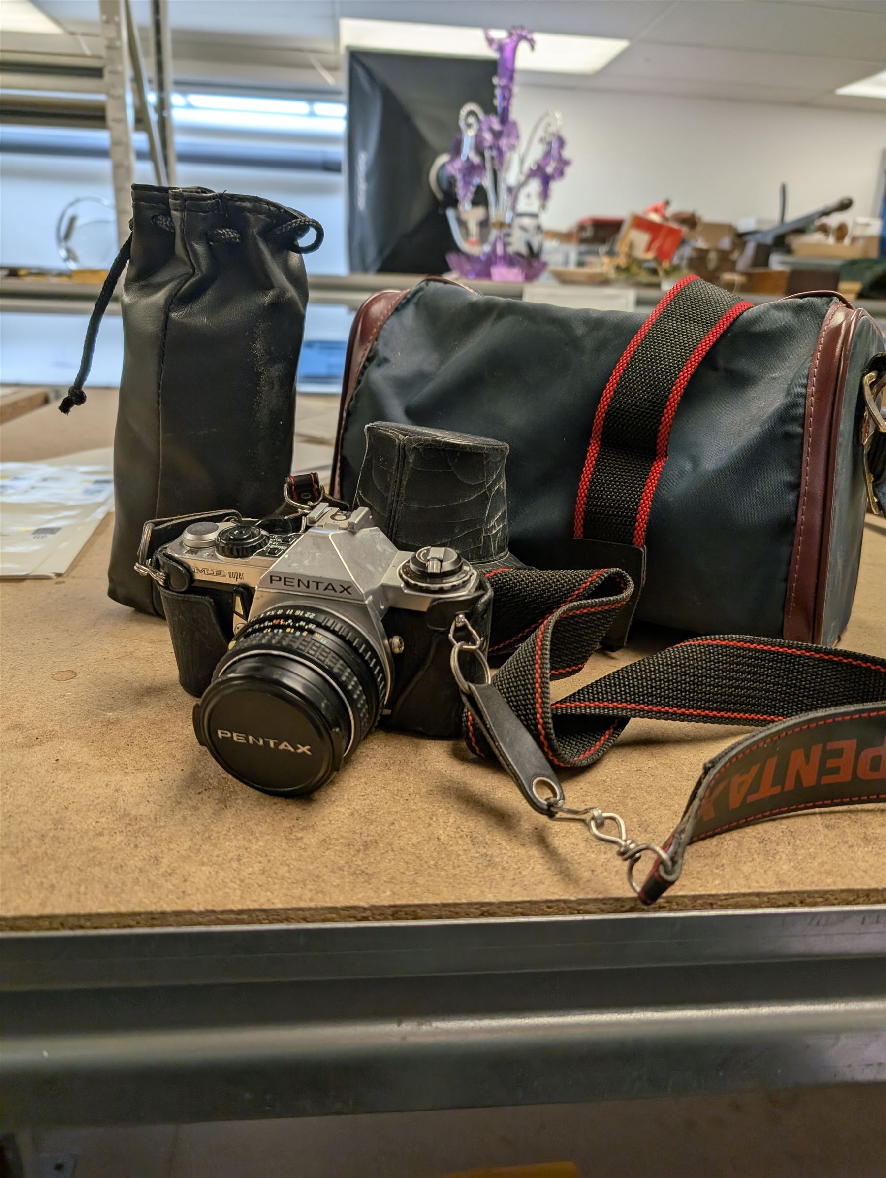 Pentax ME Super camera body, with a SMC Pentax-M 1:1.7 50mm lens and a Vivitar 28-200mm 1.3.5-5.3 Macro Focusing Zoom lens, in carry case