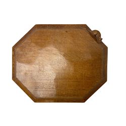 Mouseman - adzed oak breadboard, canted rectangular form with moulded edge carved with mouse signature, by the workshop of Robert Thompson, Kilburn, W31cm D26cm