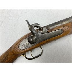 20th century Indian percussion musket, the 81cm octagonal barrel with under rib and ramrod, brass fittings including front and rear swivels, oak half stock with cheek piece and chequered pistol grip stamped 1589 L124.5cm overall
