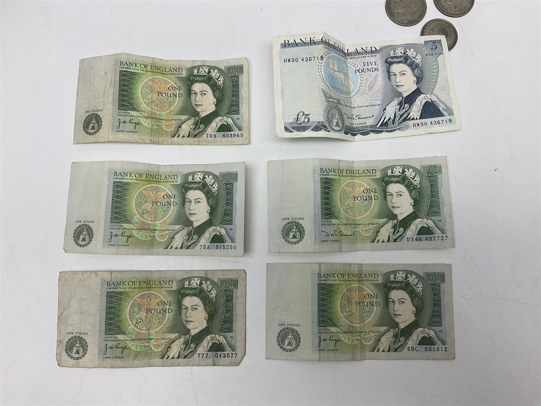 Queen Victoria 1890 crown coin, King George V 1929 half crown, 1922 florin, King George VI 1940 half crown, Bank of England Somerset five pound note 'HW30' and five one pound notes