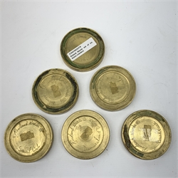Rowland Ward (British Taxidermist: 1848–1912), set of six African Animal brass paw print coasters, comprising Jackal, Klipspringer, Damaraland Dik Dik, Bushbuck, Impala and Serval Cat, signed beneath, D8cm   