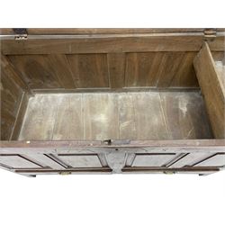 Georgian oak mule chest, moulded rectangular hinged lid over quadruple fielded panel front, the frieze inscribed '17 A Y 57', fitted with two drawers, panelled ends and back, on stile supports