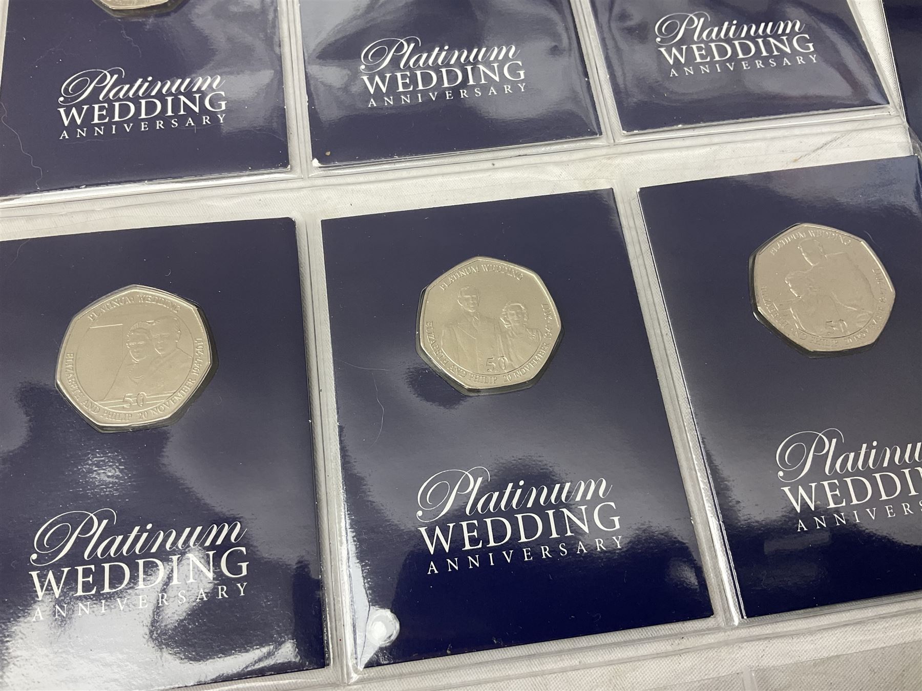 Great British and World coins, including two The Royal Mint Experience 2018 Sir Isaac Newton fifty pence coins on cards, commemorative crowns, Queen Elizabeth II 1999 five pounds, pre-decimal coinage, various Isle of Man fifty pence pieces etc