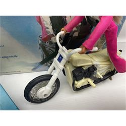 Ideal Derry Daring and Her Trick Cycle, with clothed figure on trick cycle and winder; in original illustrated box dated 1975